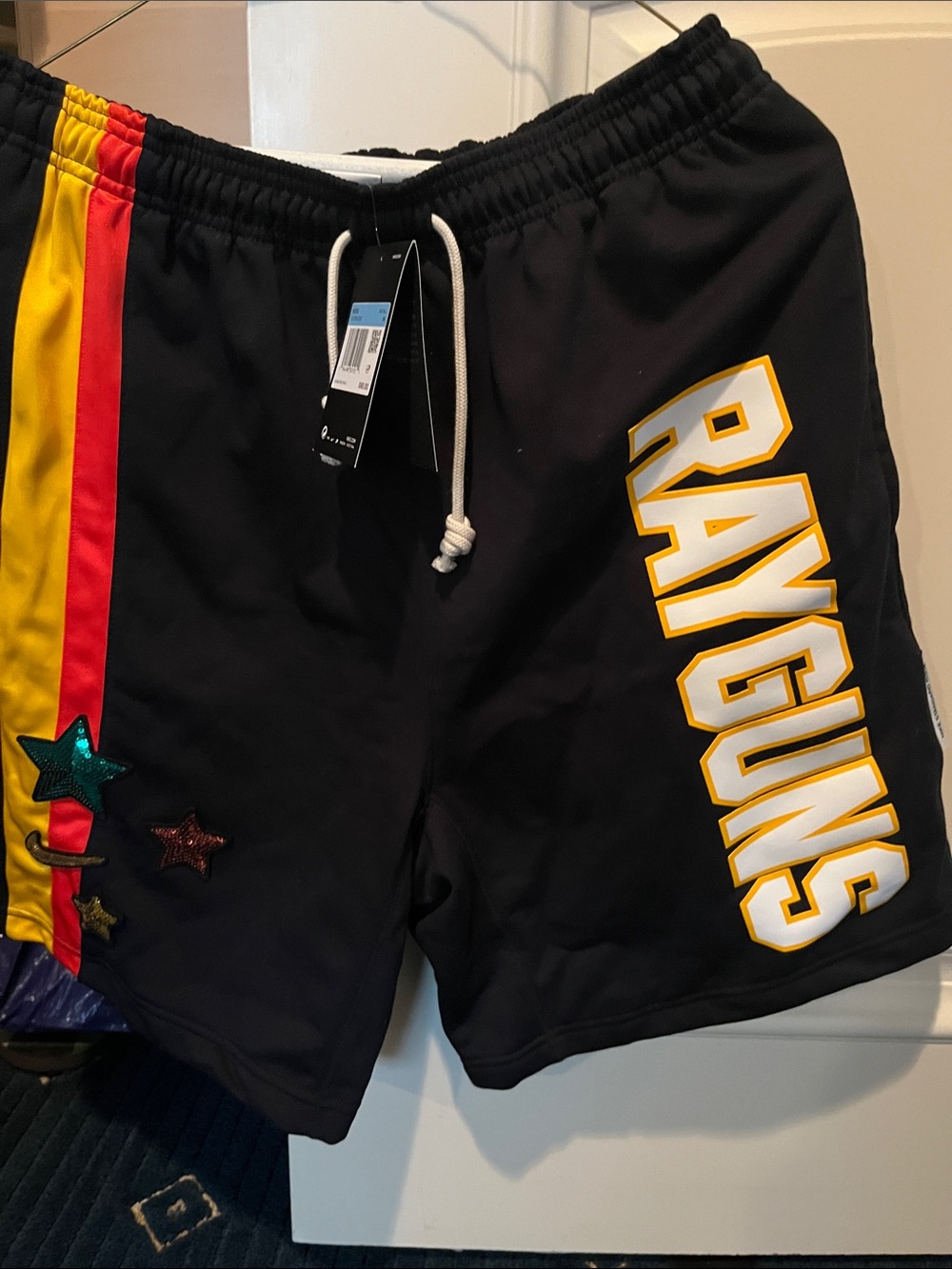Nike Black Athletic Shorts with Yellow & Red Side Panels and White Drawcord